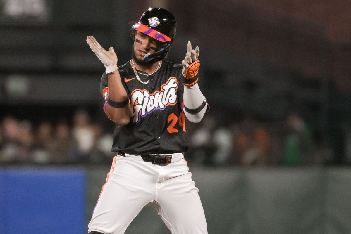 Aug 26, 2025; San Francisco, California, USA;  San Francisco Giants outfielder Luis Matos (29) celebrates after hitting a double against the Chicago Cubs during the fifth inning at Oracle Park. Mandatory Credit: Ed Szczepanski-Imagn Images