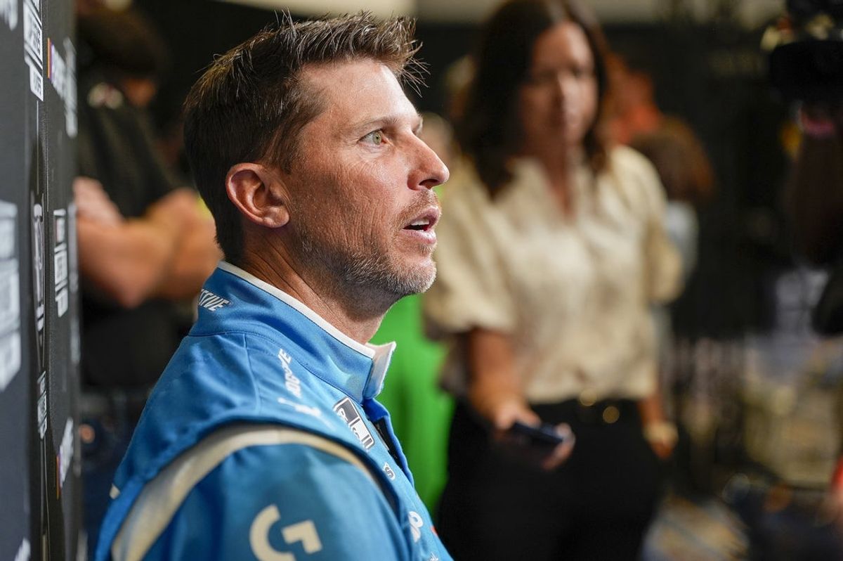Aug 27, 2025; Charlotte, NC, USA;  Denny Hamlin answers questions from the media  during NASCAR Cup Series Playoff Media Day at Charlotte Convention Center. Mandatory Credit: Jim Dedmon-Imagn Images