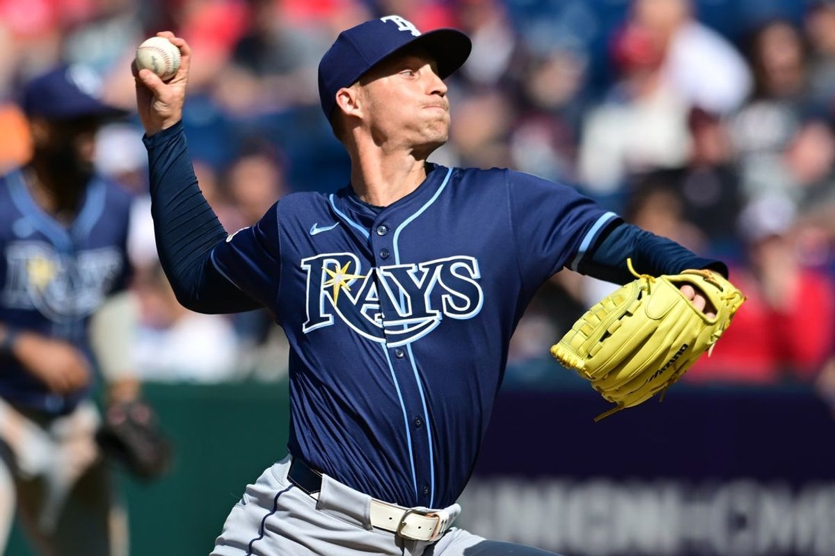 Aug 27, 2025; Cleveland, Ohio, USA; Tampa Bay Rays relief pitcher Griffin Jax (22) throws a pitch against the Cleveland Guardians during the tenth inning at Progressive Field. Mandatory Credit: Ken Blaze-Imagn Images