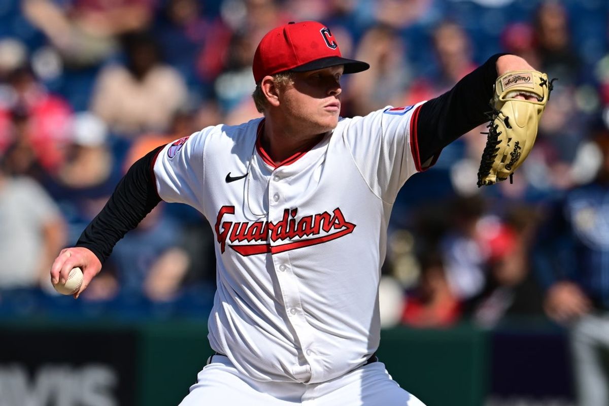 Aug 27, 2025; Cleveland, Ohio, USA; Cleveland Guardians relief pitcher Nic Enright (59) throws a pitch against the Tampa Bay Rays during the ninth inning at Progressive Field. Mandatory Credit: Ken Blaze-Imagn Images