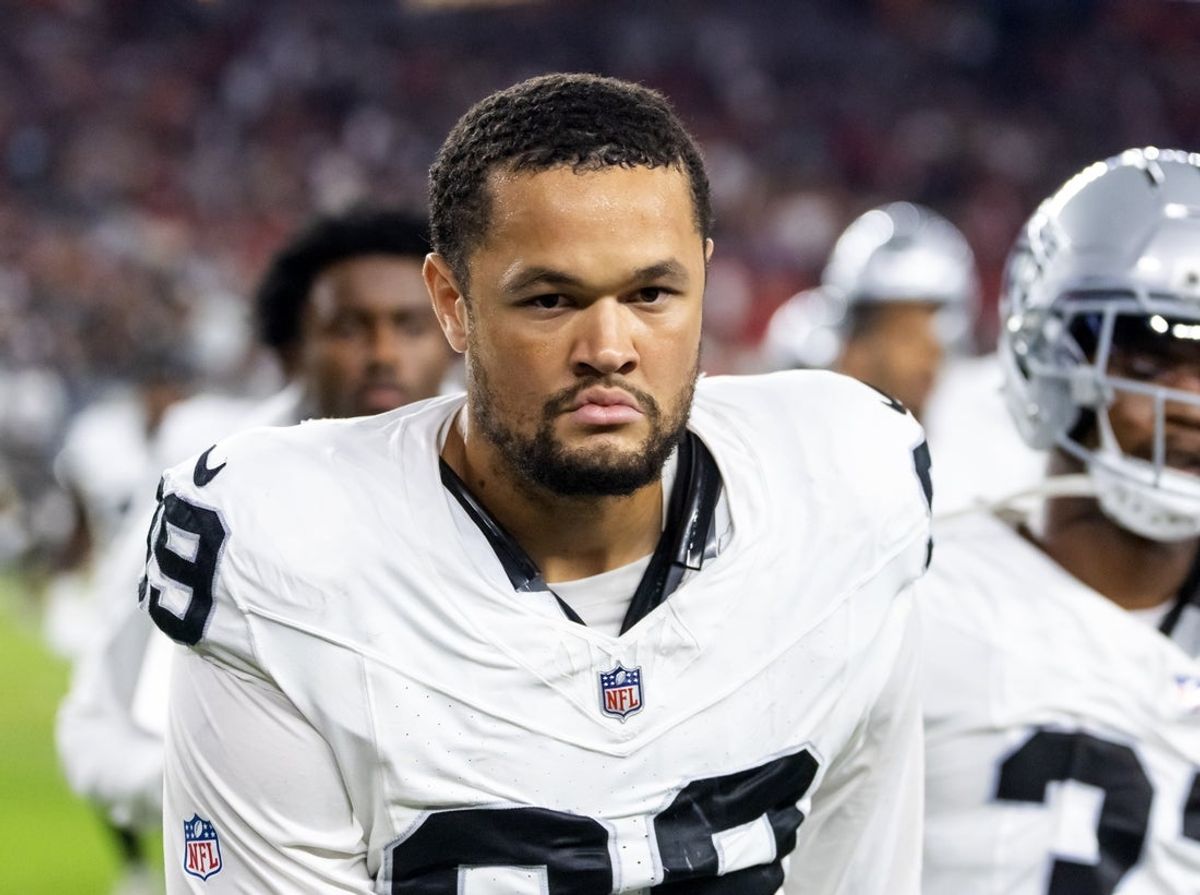 Aug 23, 2025; Glendale, Arizona, USA; Las Vegas Raiders defensive end Andre Carter II (99) against the Arizona Cardinals during a preseason NFL game at State Farm Stadium. Mandatory Credit: Mark J. Rebilas-Imagn Images