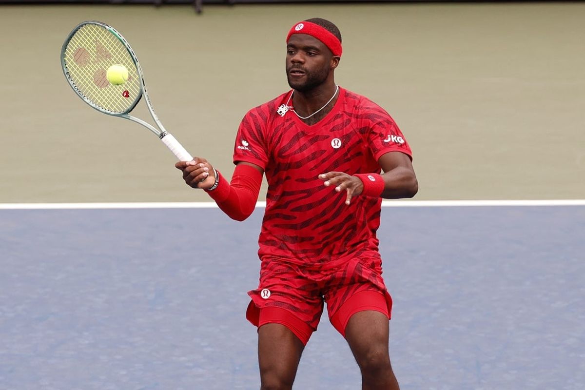 Aug 27, 2025; Flushing, NY, USA; Frances Tiafoe (USA) hits a volley against Martin Damm (USA) (not pictured) on day four of the 2025 US Open tennis tournament at Billie Jean King USTA National Tennis Center. Mandatory Credit: Geoff Burke-Imagn Images