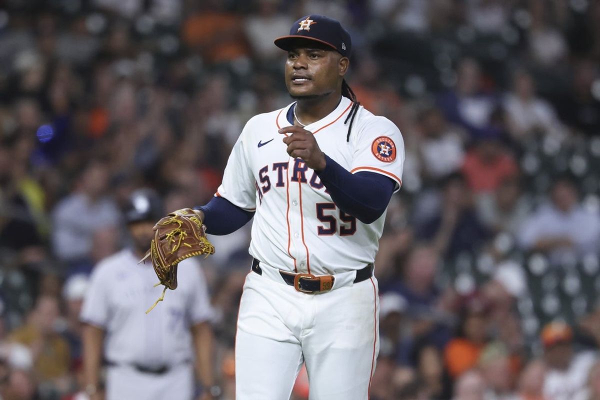 Aug 27, 2025; Houston, Texas, USA; Houston Astros starting pitcher Framber Valdez (59) reacts after a double play during the sixth inning against the Colorado Rockies at Daikin Park. Mandatory Credit: Troy Taormina-Imagn Images