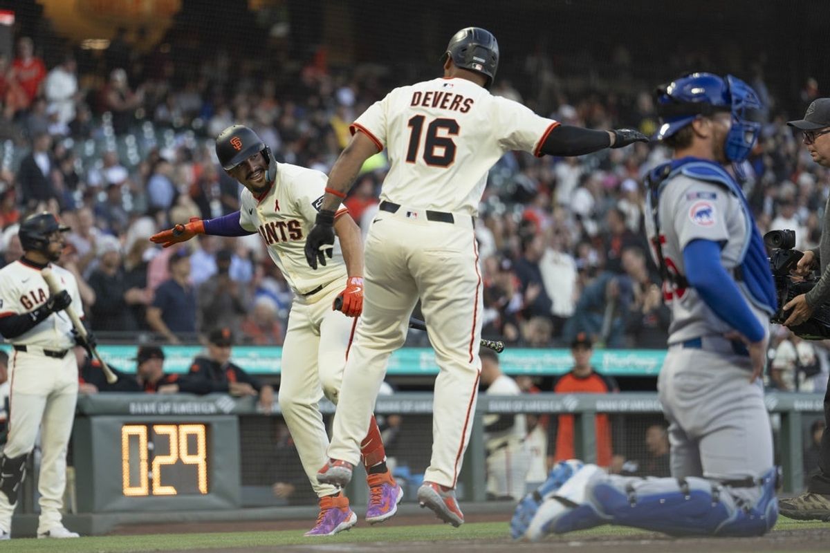 Aug 27, 2025; San Francisco, California, USA;  San Francisco Giants shortstop Willy Adames (2) celebrates with San Francisco Giants designated hitter Rafael Devers (16) during the first inning against the Chicago Cubs at Oracle Park. Mandatory Credit: Stan Szeto-Imagn Images