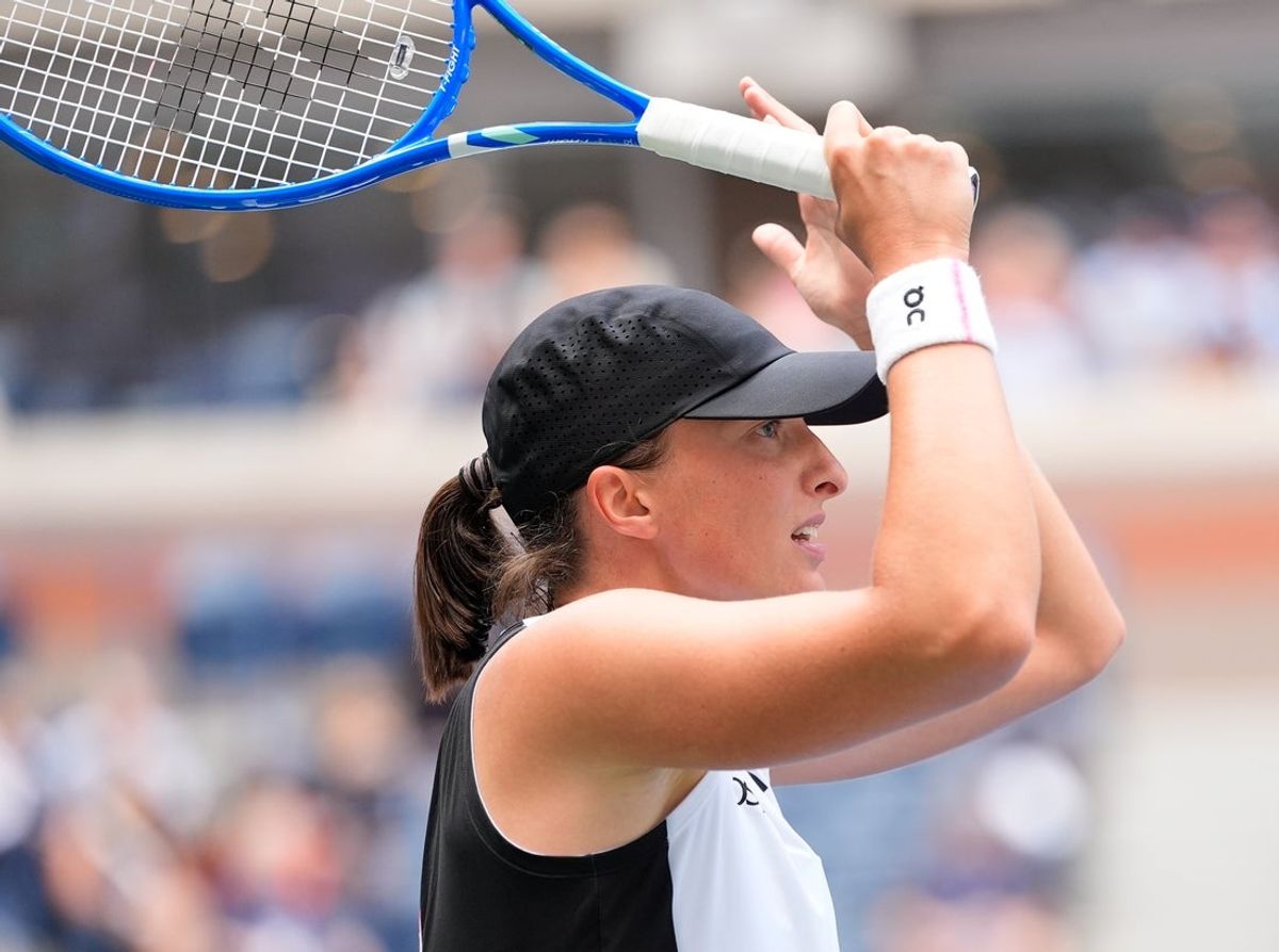 Aug 28, 2025; Flushing, NY, USA; Iga Swiatek (POL) reacts after a miss to Suzan Lamens (NED) (not pictured) on day five of the 2025 U.S. Open tennis tournament at the USTA Billie Jean King National Tennis Center. Mandatory Credit: Robert Deutsch-Imagn Images
