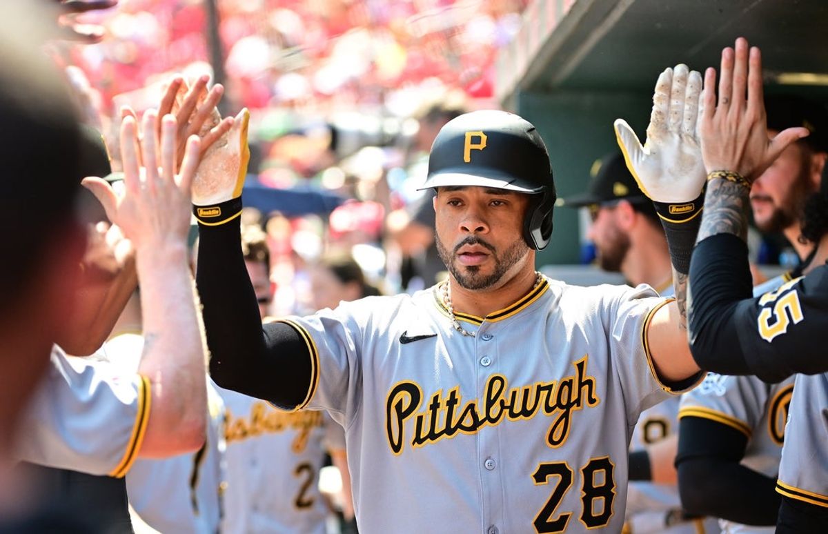 Aug 28, 2025; St. Louis, Missouri, USA; Pittsburgh Pirates left fielder Tommy Pham (28) high fives teammates in the dugout after hitting a solo home run against the St. Louis Cardinals during the first inning at Busch Stadium. Mandatory Credit: Tim Vizer-Imagn Images