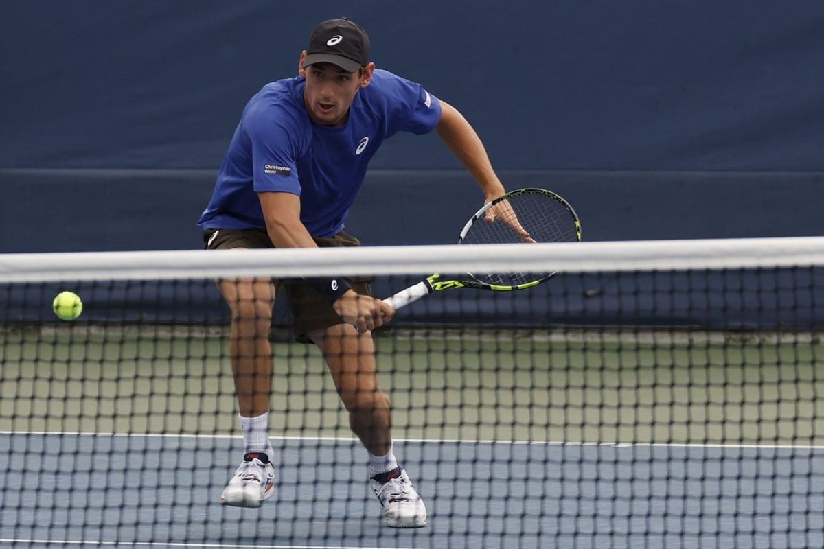 Aug 28, 2025; Flushing, NY, USA; Valentin Royer (FRA) prepares to hit a volley against Denis Shapovalov (CAN) (not pictured) on day five of the 2025 US Open tennis tournament at Billie Jean King USTA National Tennis Center.  Mandatory Credit: Geoff Burke-Imagn Images