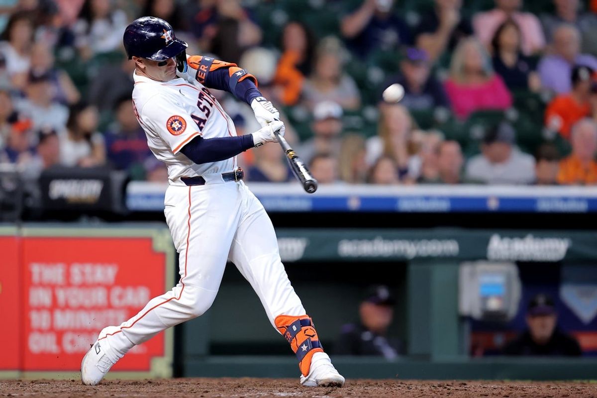 Aug 28, 2025; Houston, Texas, USA; Houston Astros first baseman Christian Walker (8) hits a solo home run against the Colorado Rockies during the eighth inning at Daikin Park. Mandatory Credit: Erik Williams-Imagn Images