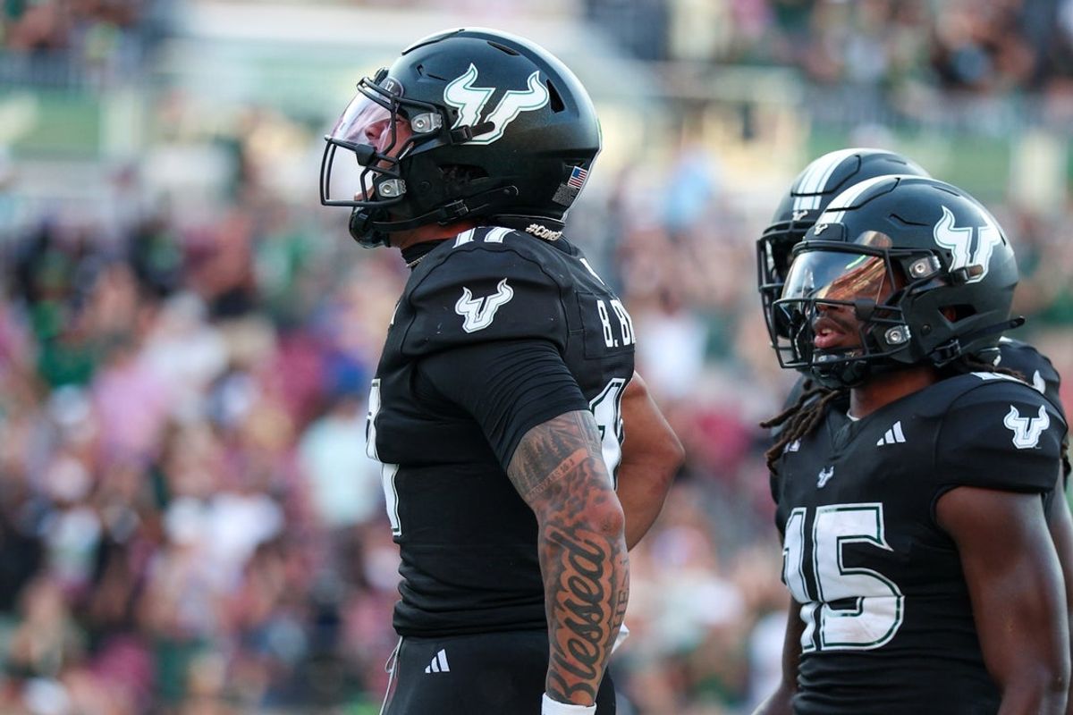 Aug 28, 2025; Tampa, Florida, USA; South Florida Bulls quarterback Byrum Brown (17) reacts after scoring a touchdown against the Boise State Broncos in the second quarter at Raymond James Stadium. Mandatory Credit: Nathan Ray Seebeck-Imagn Images