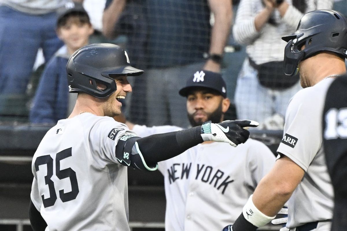 Aug 28, 2025; Chicago, Illinois, USA;  New York Yankees outfielder Cody Bellinger (35) celebrates with  designated hitter Aaron Judge (99) after they score on Bellinger’s two run home run against the  Chicago White Sox during the first inning at Rate Field. Mandatory Credit: Matt Marton-Imagn Images