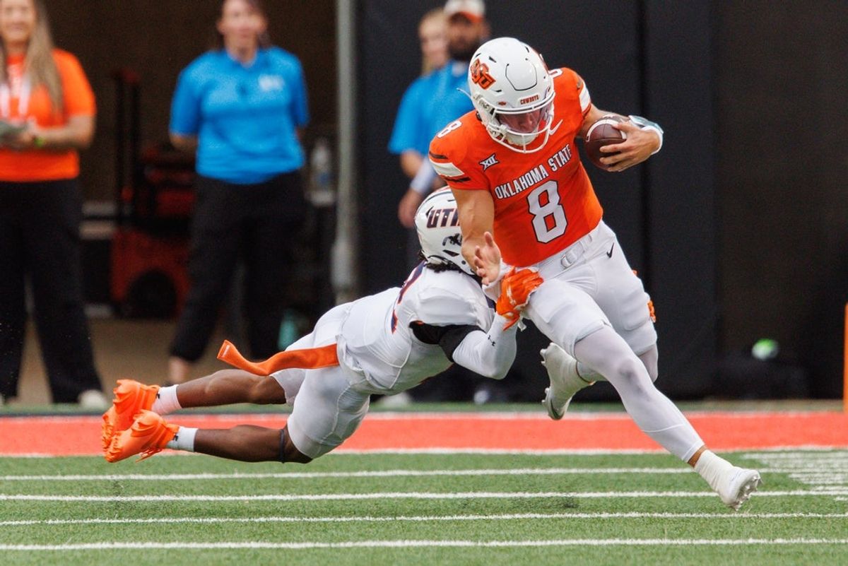 Aug 28, 2025; Stillwater, Oklahoma, USA; Oklahoma State Cowboys quarterback Hauss Hejny (8) runs the ball during the first half against the Tennessee Martin Skyhawks  at Boone Pickens Stadium. Mandatory Credit: William Purnell-Imagn Images