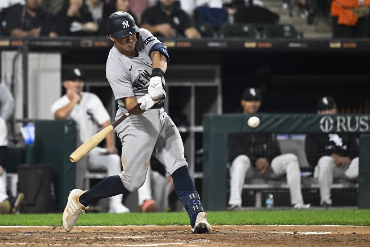Aug 28, 2025; Chicago, Illinois, USA;  New York Yankees first baseman Ben Rice (22) singles against the Chicago White Sox during the fifth inning at Rate Field. Mandatory Credit: Matt Marton-Imagn Images