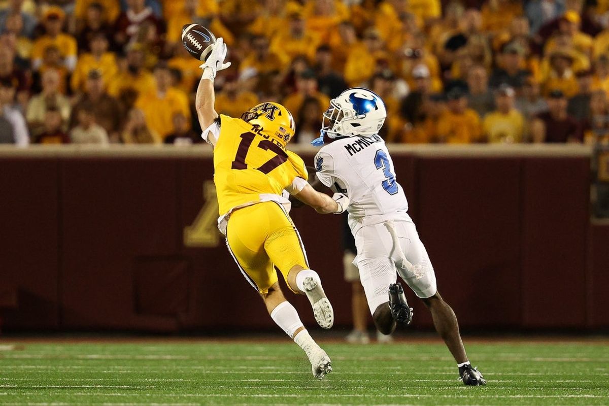 Aug 28, 2025; Minneapolis, Minnesota, USA; Minnesota Golden Gophers defensive back John Nestor (17) breaks up a pass intended for Buffalo Bulls wide receiver Nik McMillan (3) during the first half of the game at Huntington Bank Stadium. Mandatory Credit: Matt Krohn-Imagn Images