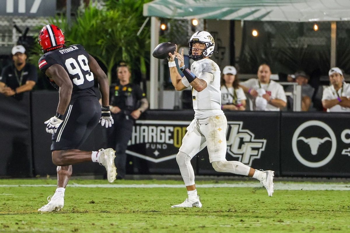 Aug 28, 2025; Orlando, Florida, USA; UCF Knights quarterback Tayven Jackson (2) looks to pass during the second half against the Jacksonville State Gamecocks at Acrisure Bounce House. Mandatory Credit: Mike Watters-Imagn Images