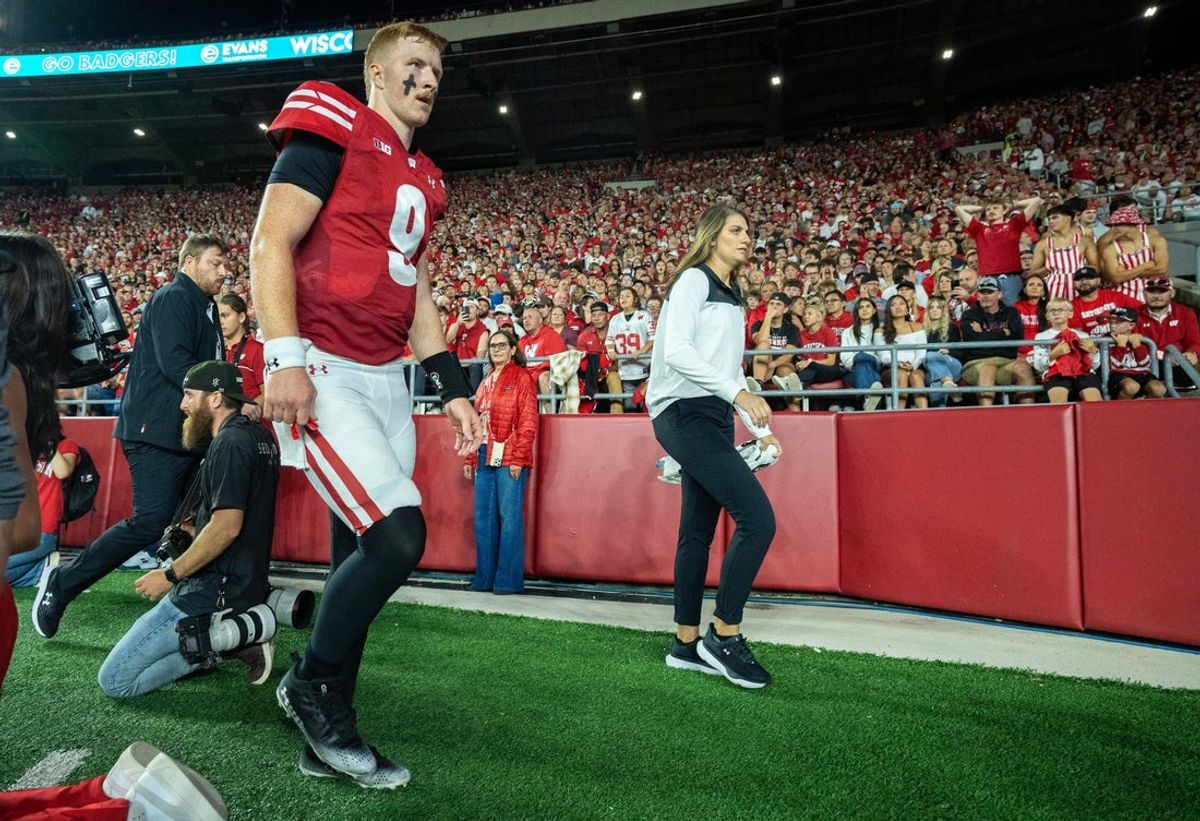 Wisconsin quarterback Billy Edwards Jr. (9) walks to the locker room after being injured during the second quarter of their game against Miami (Ohio) Thursday, August 28, 2025 at Camp Randall Stadium in Madison, Wisconsin.