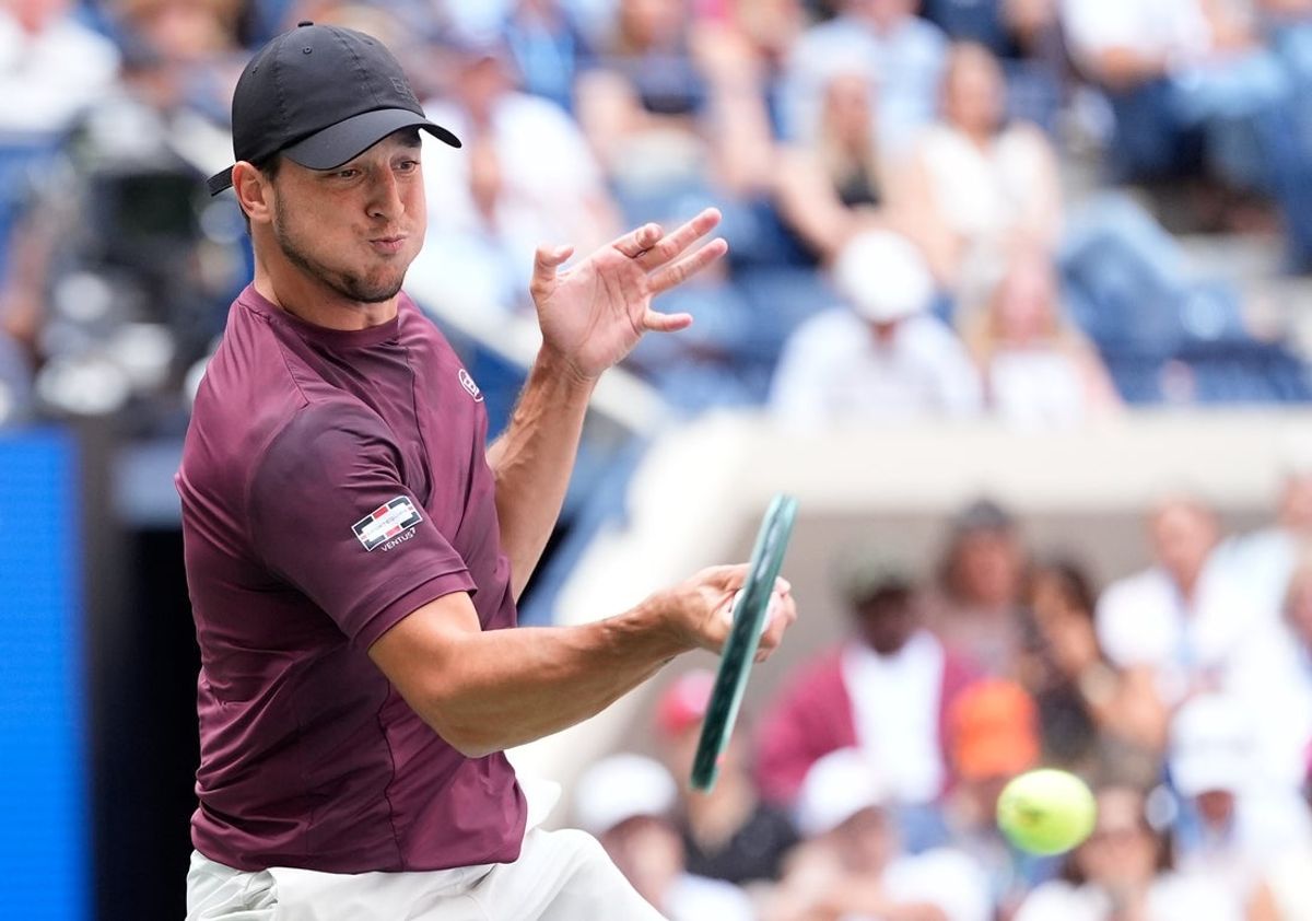 Aug 29, 2025; Flushing, NY, USA;  Luciano Darderi (ITA) hits to Carlos Alcaraz (ESP) (not pictured) on day six of the 2025 U.S. Open tennis tournament at the USTA Billie Jean King National Tennis Center. Mandatory Credit: Robert Deutsch-Imagn Images