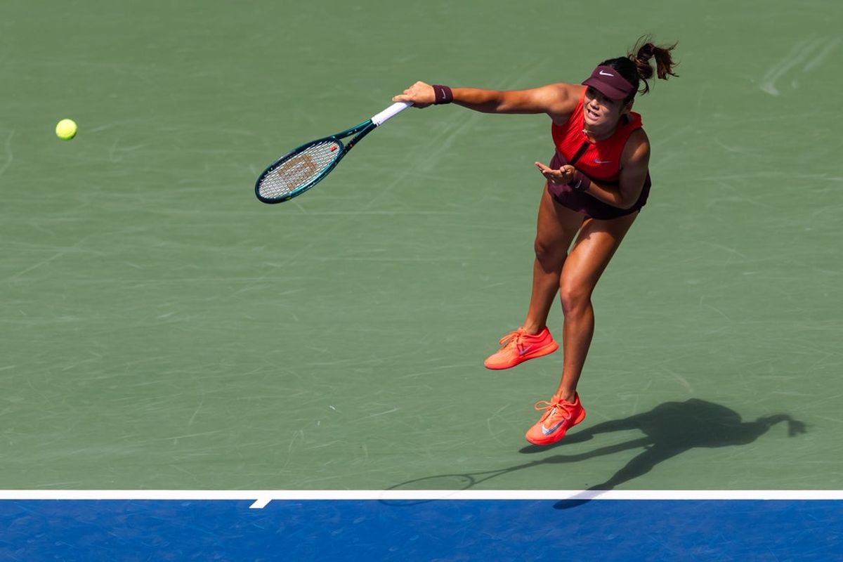Aug 29, 2025; Flushing, NY, USA; Emma Raducanu of United Kingdom in action against Elena Rybakina of Kazakhstan in the third round of the womenís singles at the US Open at Louis Armstrong Stadium in Billie Jean King National Tennis Center. Mandatory Credit: Mike Frey-Imagn Images