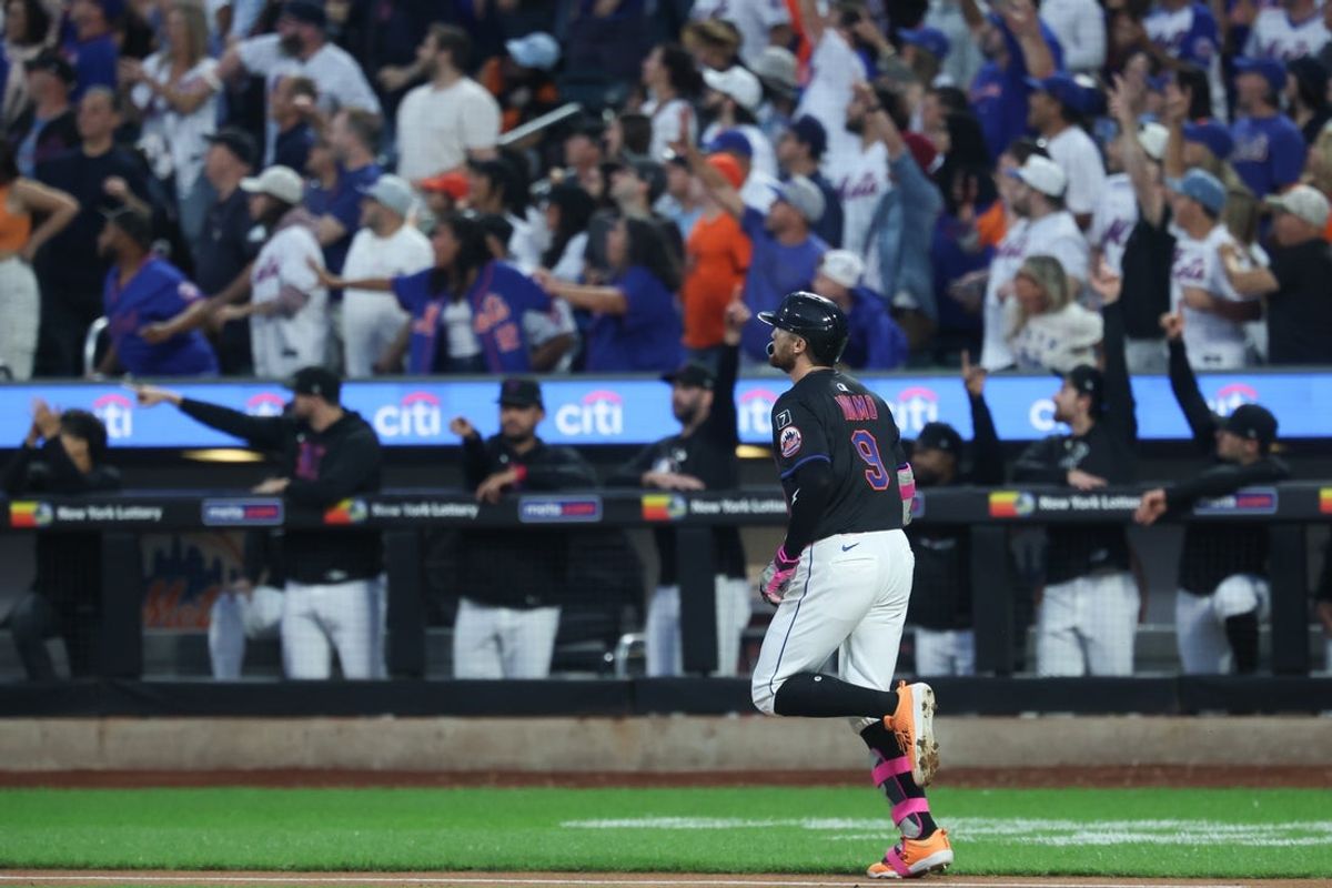 Aug 29, 2025; New York City, New York, USA; New York Mets left fielder Brandon Nimmo (9) hits a three run home run during the first inning against the Miami Marlins at Citi Field. Mandatory Credit: Vincent Carchietta-Imagn Images