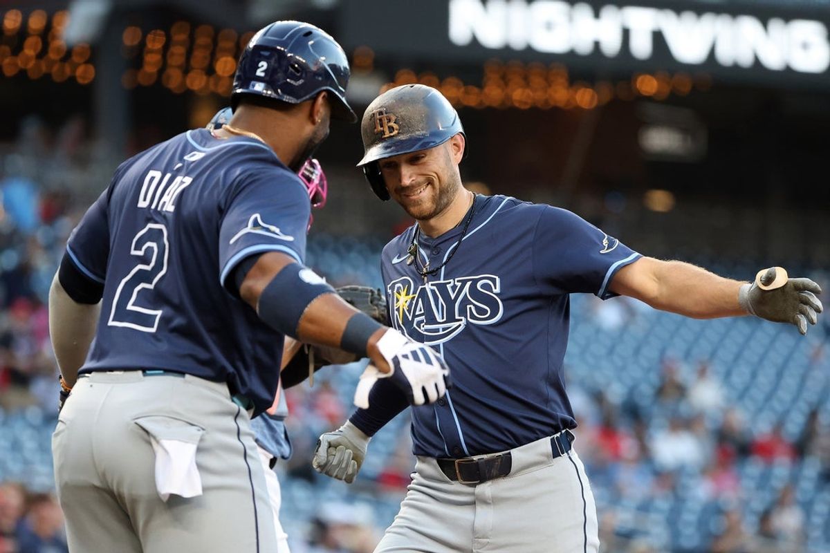 Aug 29, 2025; Washington, District of Columbia, USA; Tampa Bay Rays second baseman Brandon Lowe (8) celebrates with Tampa Bay Rays first baseman Yandy Diaz (2) after hitting a home run during the first inning against the Washington Nationals at Nationals Park. Mandatory Credit: Daniel Kucin Jr.-Imagn Images