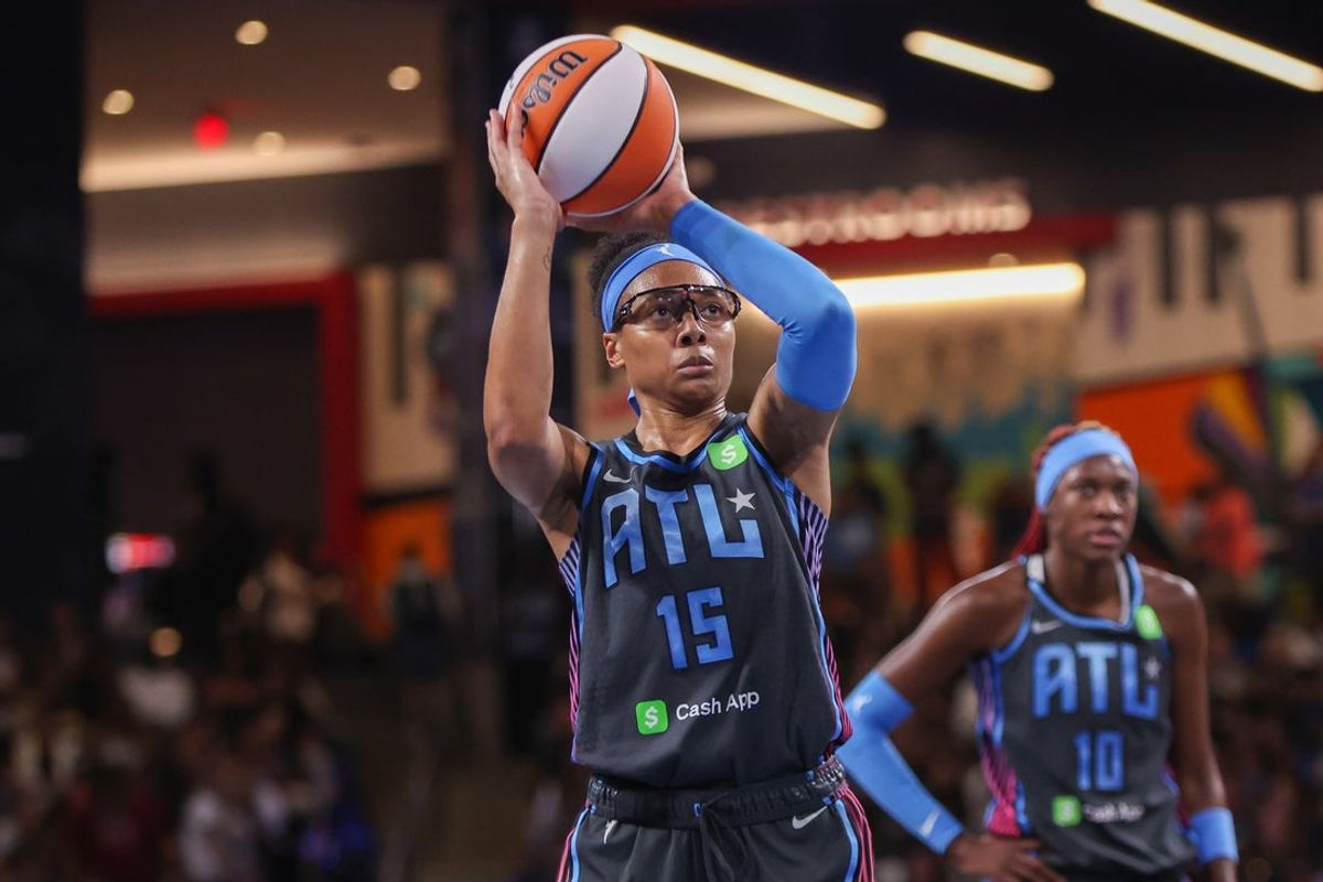 Aug 29, 2025; College Park, Georgia, USA; Atlanta Dream guard Allisha Gray (15) shoots a free throw against the Dallas Wings in the second quarter at Gateway Center Arena at College Park. Mandatory Credit: Brett Davis-Imagn Images