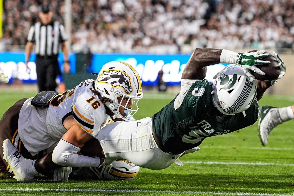 Michigan State running back Makhi Frazier (5) runs for a touchdown against Western Michigan safety Jaden Lyles (16) during the first half at Spartan Stadium in East Lansing on Friday, August 29, 2025.