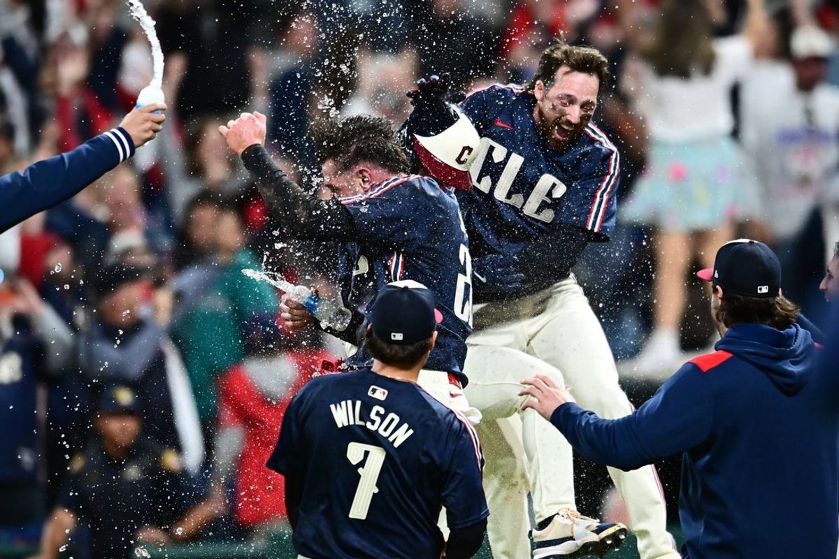 Aug 29, 2025; Cleveland, Ohio, USA; Cleveland Guardians left fielder Steven Kwan (38) celebrates with teammates after hitting a game winning sacrifice fly against the Seattle Mariners during the ninth inning at Progressive Field. Mandatory Credit: Ken Blaze-Imagn Images
