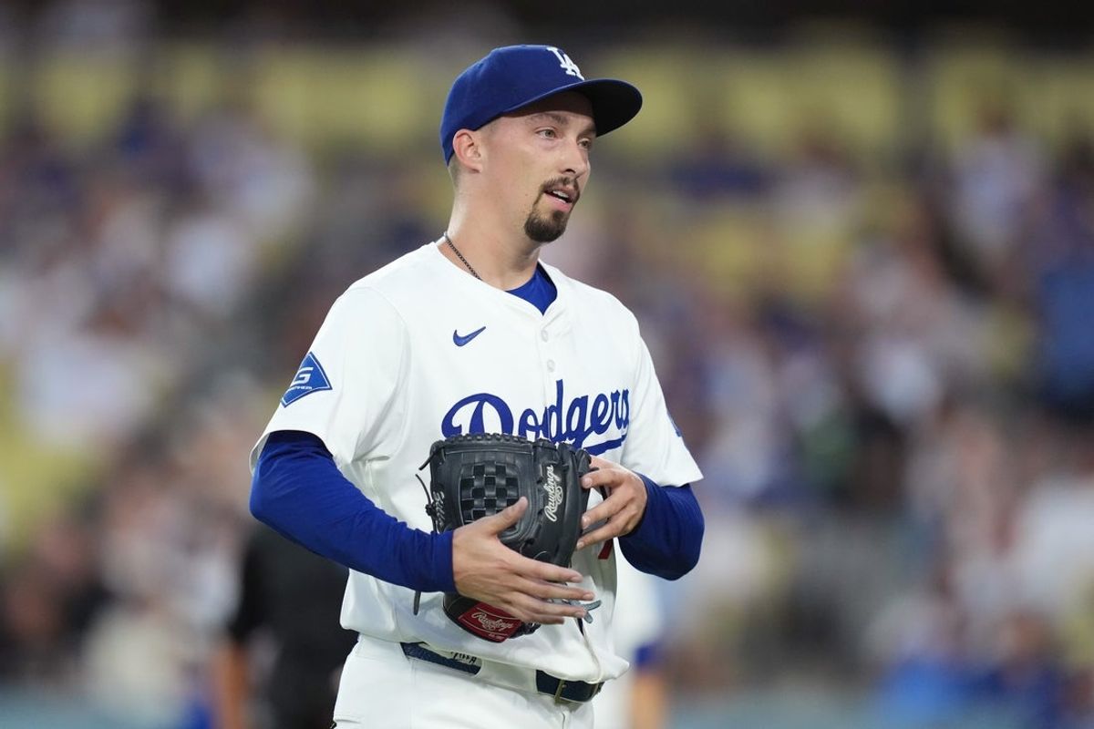 Aug 29, 2025; Los Angeles, California, USA; Los Angeles Dodgers starting pitcher Blake Snell (7) reacts in the first inning against the Arizona Diamondbacks at Dodger Stadium. Mandatory Credit: Kirby Lee-Imagn Images