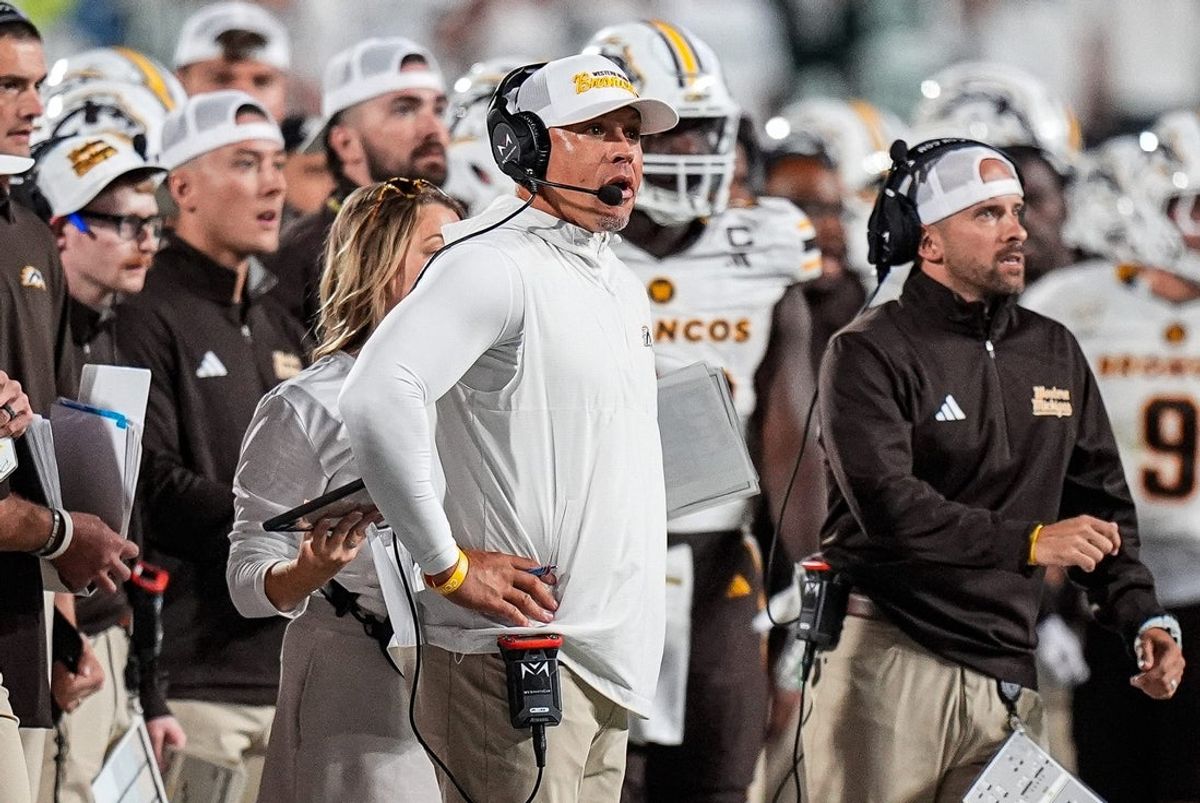 Western Michigan head coach Lance Taylor, center, watches a play against Michigan State during the second half at Spartan Stadium in East Lansing on Friday, August 29, 2025.