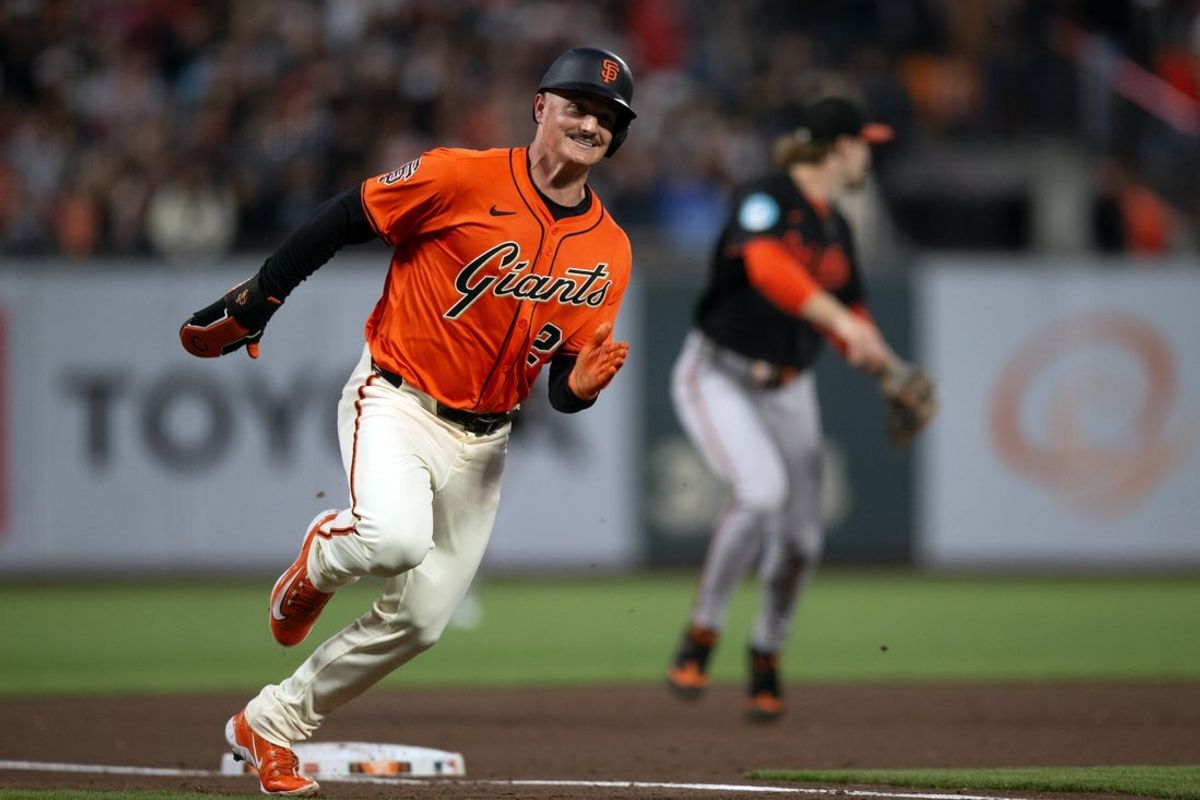 Aug 29, 2025; San Francisco, California, USA; San Francisco Giants third baseman Matt Chapman (26) rounds third and heads for home against the Baltimore Orioles during the first inning at Oracle Park. Mandatory Credit: D. Ross Cameron-Imagn Images