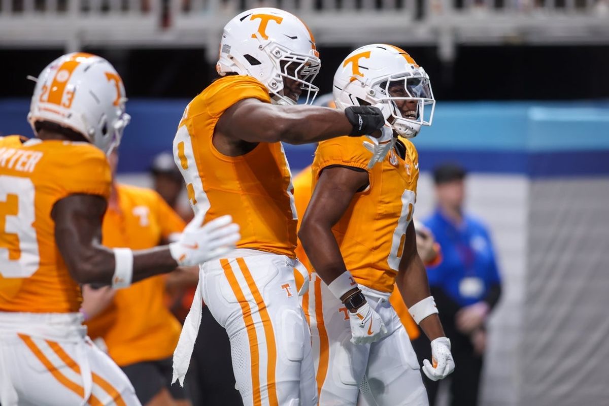 Aug 30, 2025; Atlanta, Georgia, USA; Tennessee Volunteers defensive lineman David Reese (8) celebrates after a touchdown against the Syracuse Orange in the first quarter at Mercedes-Benz Stadium. Mandatory Credit: Brett Davis-Imagn Images
