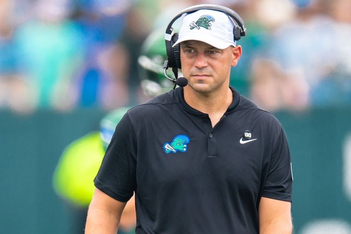 Aug 30, 2025; New Orleans, Louisiana, USA; Tulane Green Wave head coach Jon Sumrall looks on against Northwestern Wildcats during the first half at Yulman Stadium. Mandatory Credit: Stephen Lew-Imagn Images