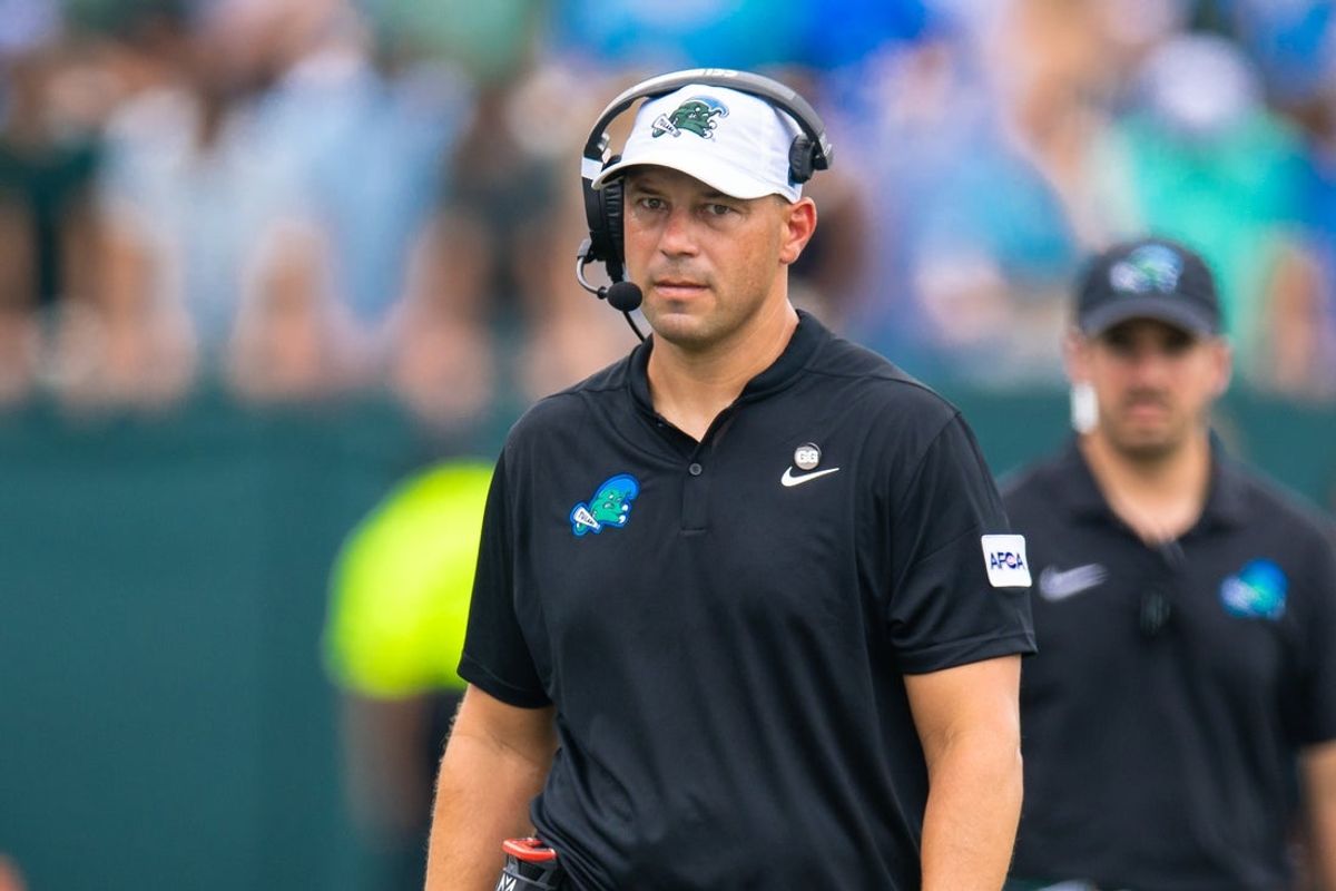 Aug 30, 2025; New Orleans, Louisiana, USA; Tulane Green Wave head coach Jon Sumrall looks on against Northwestern Wildcats during the first half at Yulman Stadium. Mandatory Credit: Stephen Lew-Imagn Images