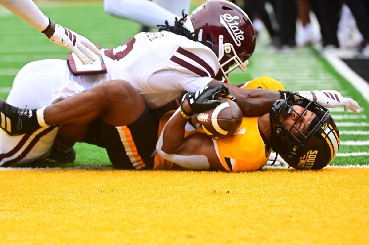 Southern Miss Golden Eagles wide receiver Micah Davis (6) catches a pass in the end zone against the Mississippi State Bulldogs at M.M. Roberts Stadium in Hattiesburg, Miss., on Aug. 30, 2025.