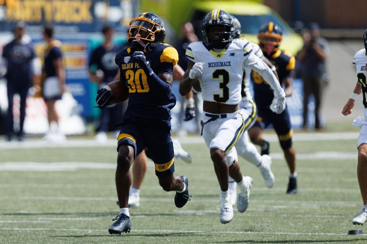 Kent State wide receiver Da'Realyst Clark runs back a kickoff for a touchdown in the final minutes of the game to put Kent State ahead during the season opener against Merrimack College Saturday, August 30, 2025 in Kent, OH.
