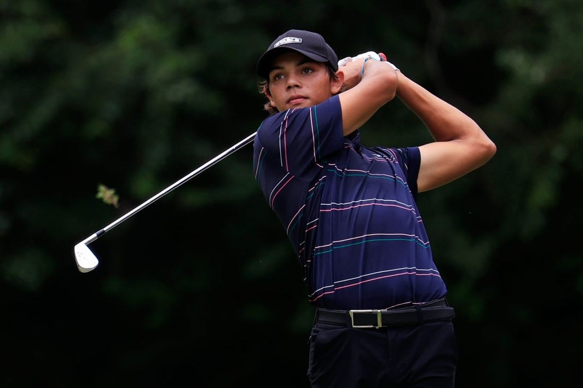 Charlie Woods of Jupiter, Fla. tees off on the eighth hole during the second round of The Junior Players Championship golf tournament at TPC Sawgrass, Saturday, Aug. 30, 2025, in Ponte Vedra Beach, Fla. Miles Russell of Jacksonville Beach, Fla. finished atop the leaderboard heading into Sunday’s final round at 6 under par.