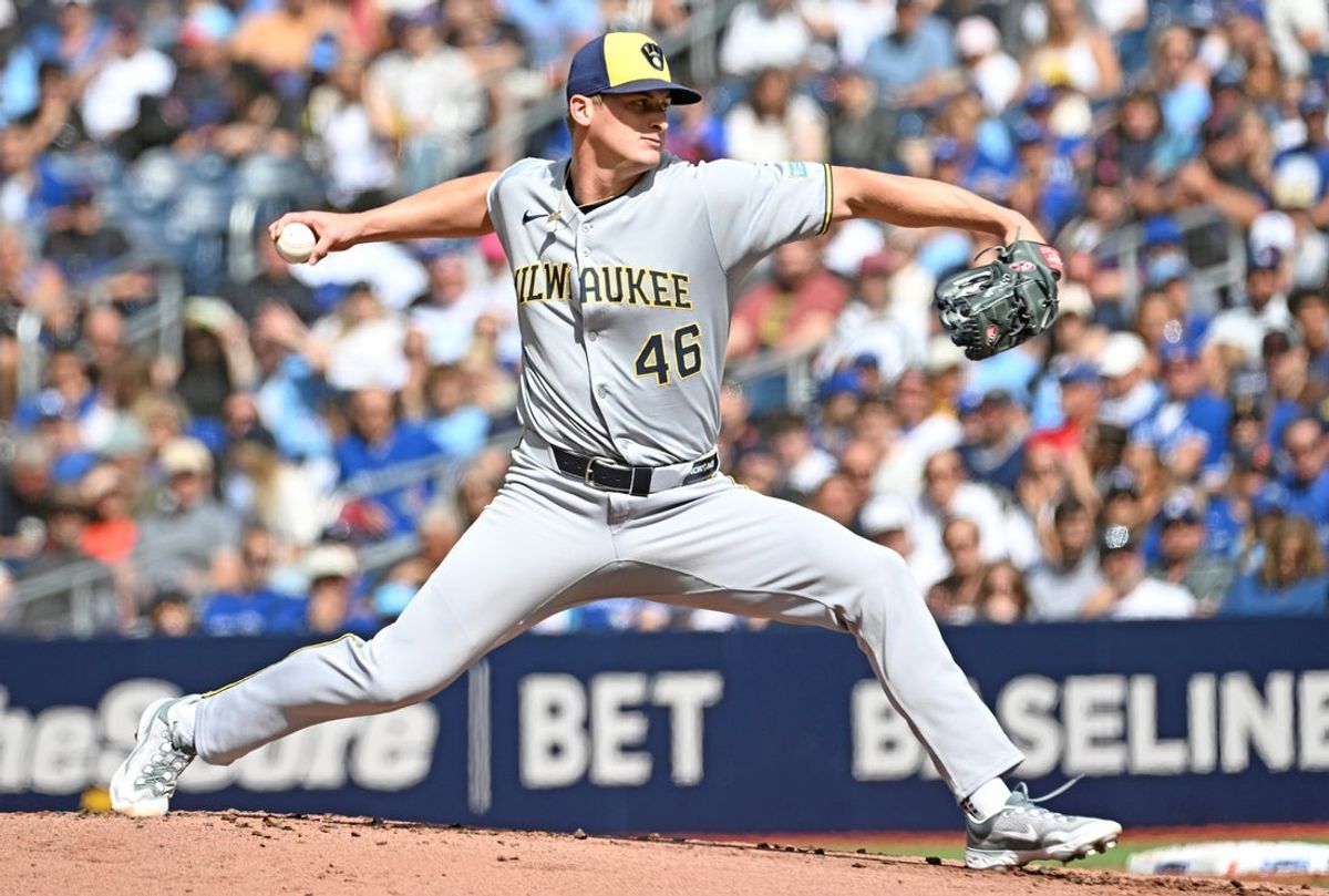 Aug 30, 2025; Toronto, Ontario, CAN;  Milwaukee Brewers starting pitcher Quinn Priester (46) delivers a pitch against the Toronto Blue Jays in the first inning at Rogers Centre. Mandatory Credit: Dan Hamilton-Imagn Images