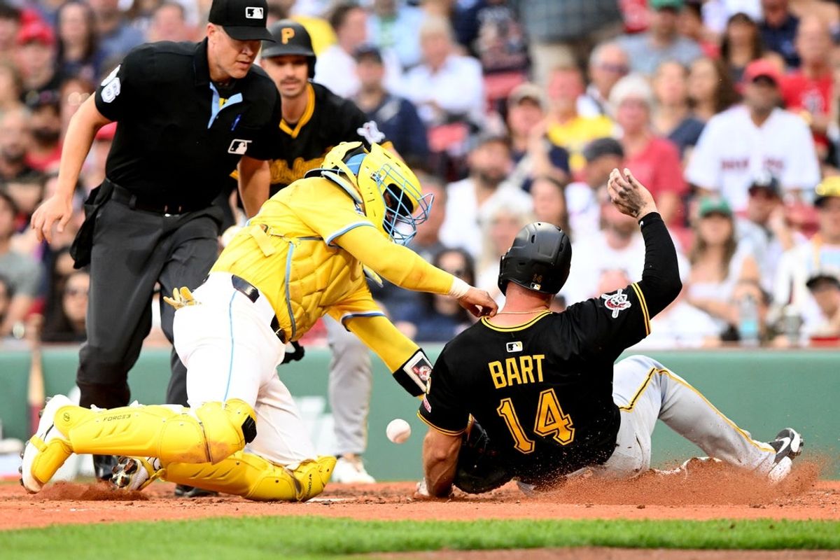 Aug 30, 2025; Boston, Massachusetts, USA; Boston Red Sox catcher Carlos Narvaez (75) fails to make the tag at home against Pittsburgh Pirates catcher Joey Bart (14) during the sixth inning at Fenway Park. Mandatory Credit: Brian Fluharty-Imagn Images