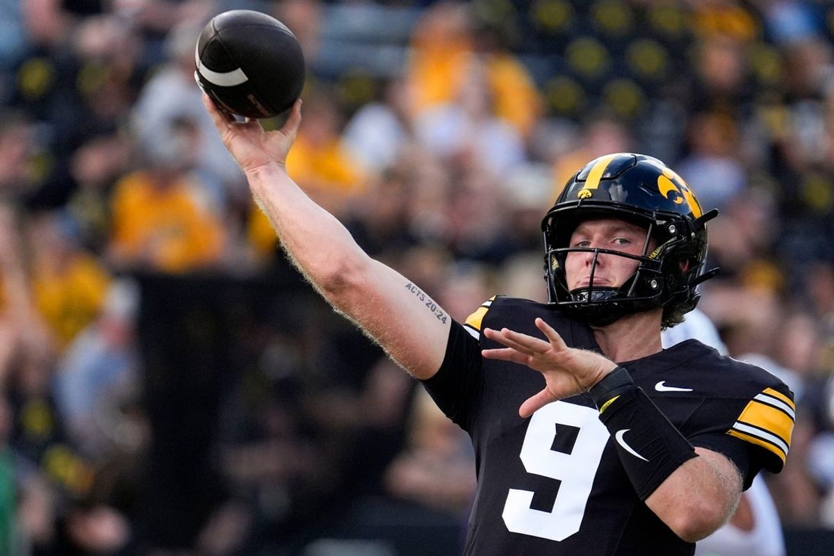Iowa Hawkeyes quarterback Hank Brown (9) warms up before playing the Albany Great Danes Aug. 30, 2025 at Kinnick Stadium in Iowa City, Iowa.