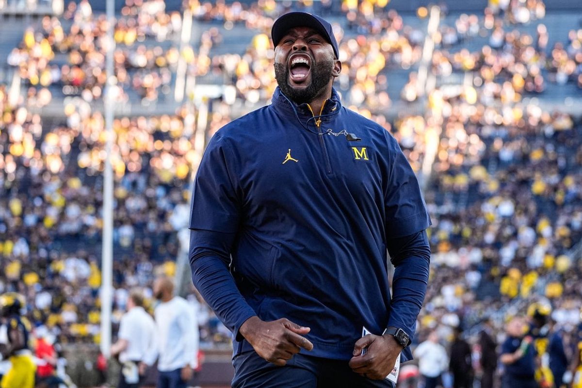 Michigan head coach Sherrone Moore fires up the student section during warm up ahead of the New Mexico game at Michigan Stadium in Ann Arbor on Saturday, August 30, 2025.