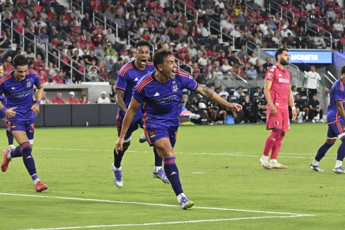 Aug 30, 2025; St. Louis, Missouri, USA; Houston Dynamo forward Ezequiel Ponce (10) celebrates his goal against the St. Louis City during the first half at Energizer Park. Mandatory Credit: Scott Rovak-Imagn Images