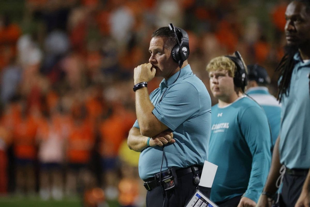 Aug 30, 2025; Charlottesville, Virginia, USA; Coastal Carolina Chanticleers head coach Tim Beck looks on from the sidelines against the Virginia Cavaliers during the second half at Scott Stadium. Mandatory Credit: Amber Searls-Imagn Images