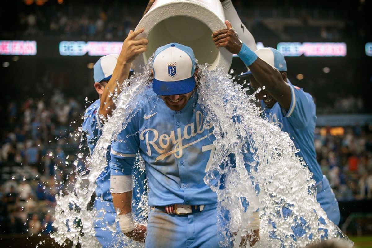 Aug 30, 2025; Kansas City, Missouri, USA; Kansas City Royals shortstop Bobby Witt Jr. (7) gets splashed after the game against the Detroit Tigers at Kauffman Stadium. Mandatory Credit: William Purnell-Imagn Images