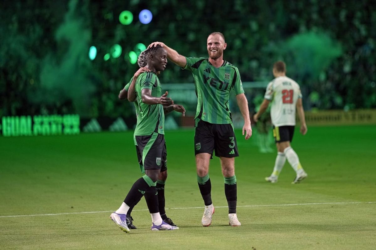 Aug 30, 2025; Austin, Texas, USA; Austin FC defender Mikkel Desler (3) forward Osman Bukari (11) react after a goal was scored during the second half against San Jose Earthquakes at Q2 Stadium. Mandatory Credit: Scott Wachter-Imagn Images