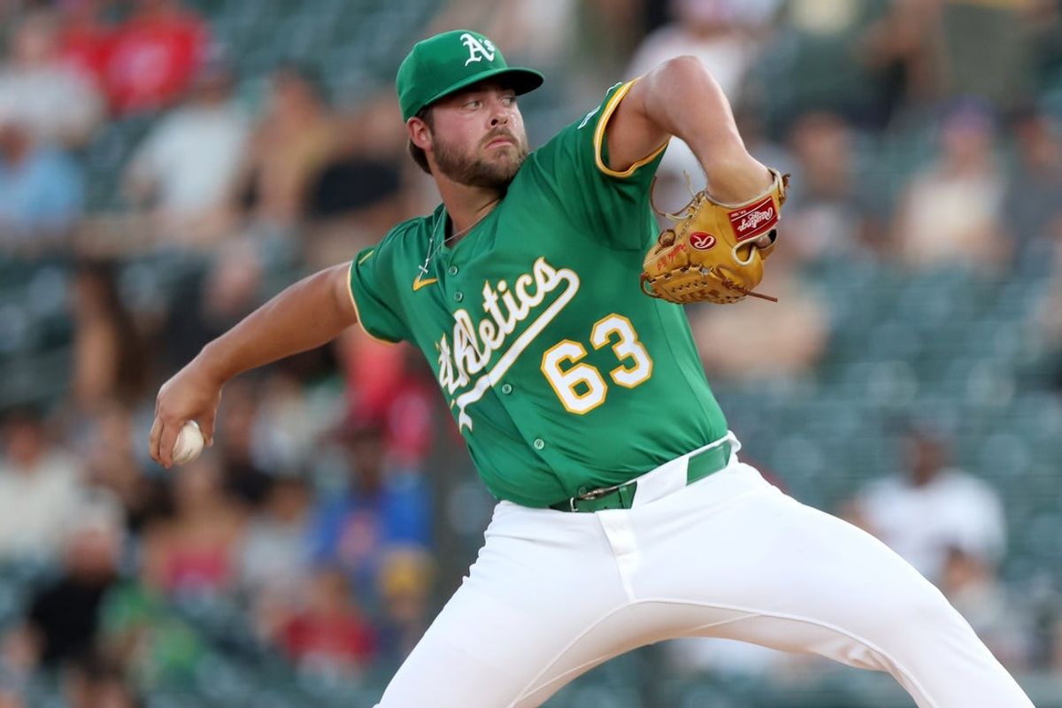 Aug 30, 2025; West Sacramento, California, USA; Athletics starting pitcher Mason Barnett (63) throws a pitch against the Texas Rangers during the first inning at Sutter Health Park. Mandatory Credit: Dennis Lee-Imagn Images