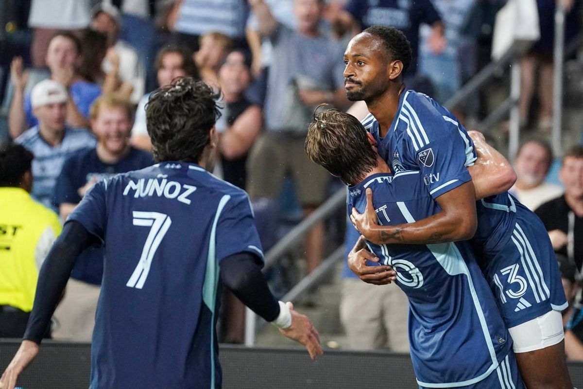 Aug 30, 2025; Kansas City, Kansas, USA; Sporting Kansas City forward Mason Toye (13) celebrates with team mates after scoring against the Colorado Rapids during the second half of the game at Children's Mercy Park. Mandatory Credit: Denny Medley-Imagn Images