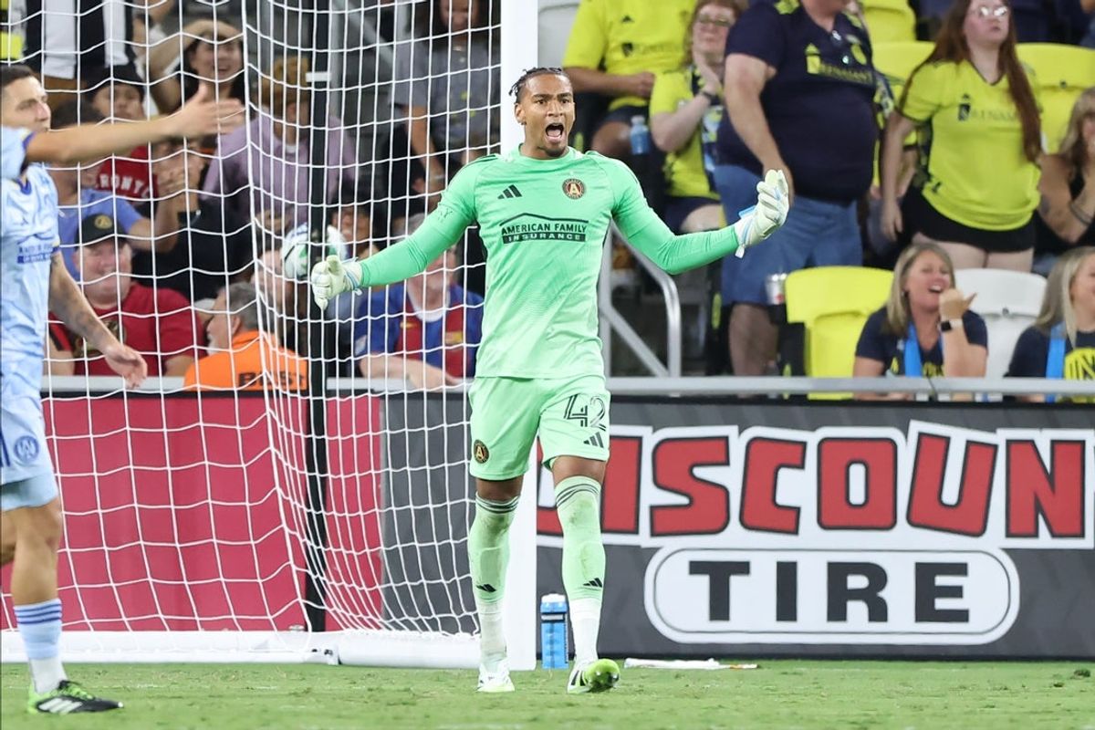 Aug 30, 2025; Nashville, Tennessee, USA; Atlanta United goalkeeper Jayden Hibbert (42) screams to the referee after a call and receives a yellow card in the second half against Nashville SC at Geodis Park. Mandatory Credit: Casey Gower-Imagn Images