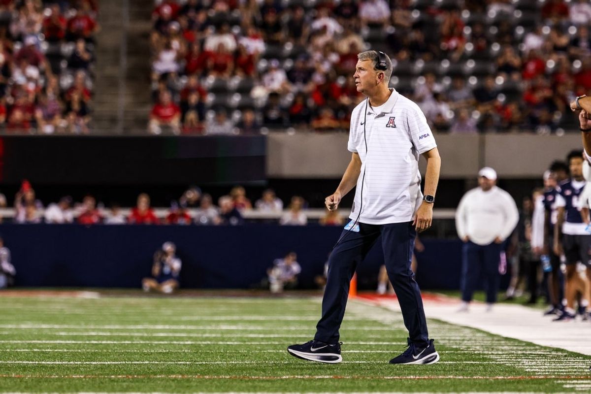 Aug 30, 2025; Tucson, Arizona, USA; Arizona Wildcats head coach Brent Brennan watches the game from the sidelines during the first quarter against the Hawaii Rainbow Warriors at Arizona Stadium. Mandatory Credit: Aryanna Frank-Imagn Images