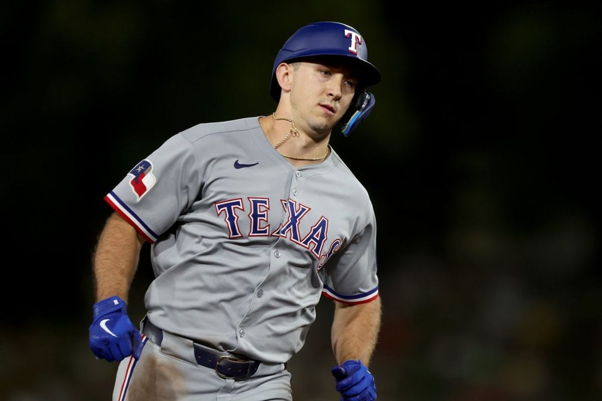 Aug 30, 2025; West Sacramento, California, USA; Texas Rangers left fielder Wyatt Langford (36) rounds the bases after hitting a solo home run against the Athletics during the fifth inning at Sutter Health Park. Mandatory Credit: Dennis Lee-Imagn Images