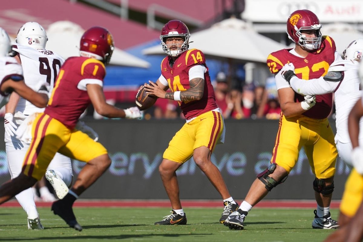 Aug 30, 2025; Los Angeles, California, USA; Southern California Trojans quarterback Jayden Maiava (14) throws the ball against the Missouri State Bears in the first half at United Airlines Field at Los Angeles Memorial Coliseum. Mandatory Credit: Kirby Lee-Imagn Images