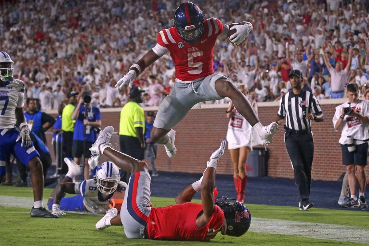 Aug 30, 2025; Oxford, Mississippi, USA; Mississippi Rebels running back Kewan Lacy (5) reacts after scoring a touchdown during the third quarter against the Georgia State Panthers at Vaught-Hemingway Stadium. Mandatory Credit: Petre Thomas-Imagn Images